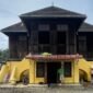 Rumah Datuk Pulau Kampai di Tanjung Pura yang terdampak banjir.